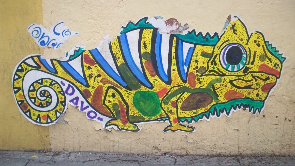 Arte psicodélica com cogumelos e cores vibrantes representando pesquisas com psilocibina e ciência psicodélica